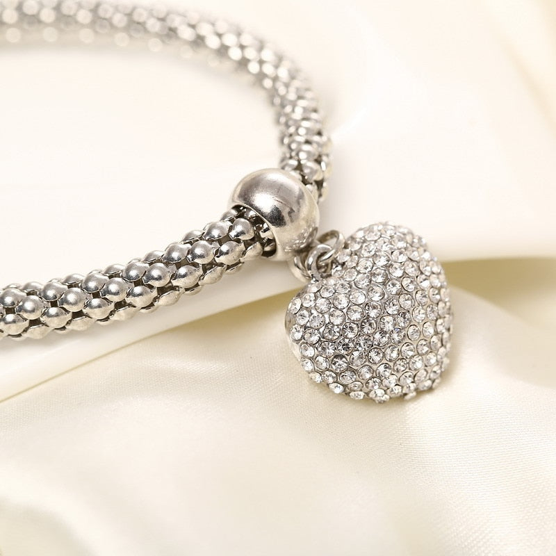 Aria – Pulsera de Metal con Corazones Sólidos