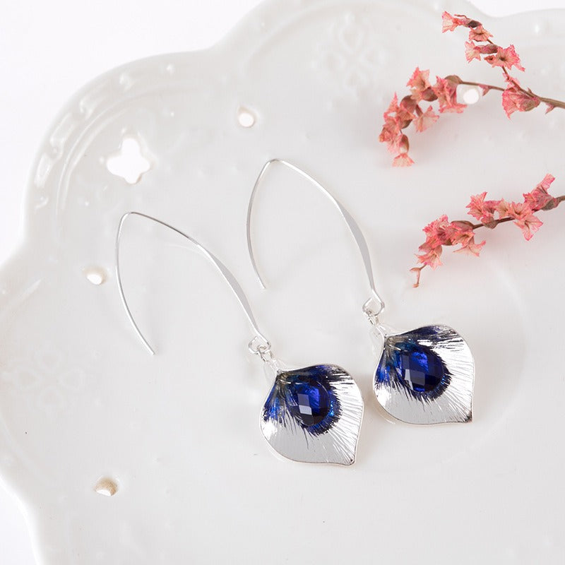Kreselle – Pendientes de loto azul en plata
