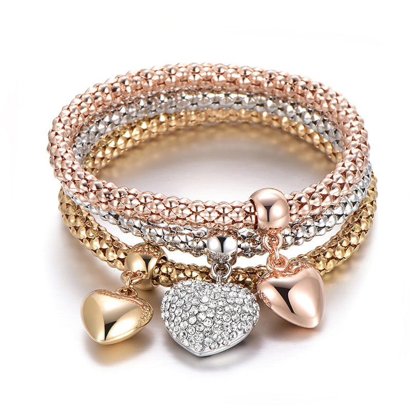 Aria – Pulsera de Metal con Corazones Sólidos