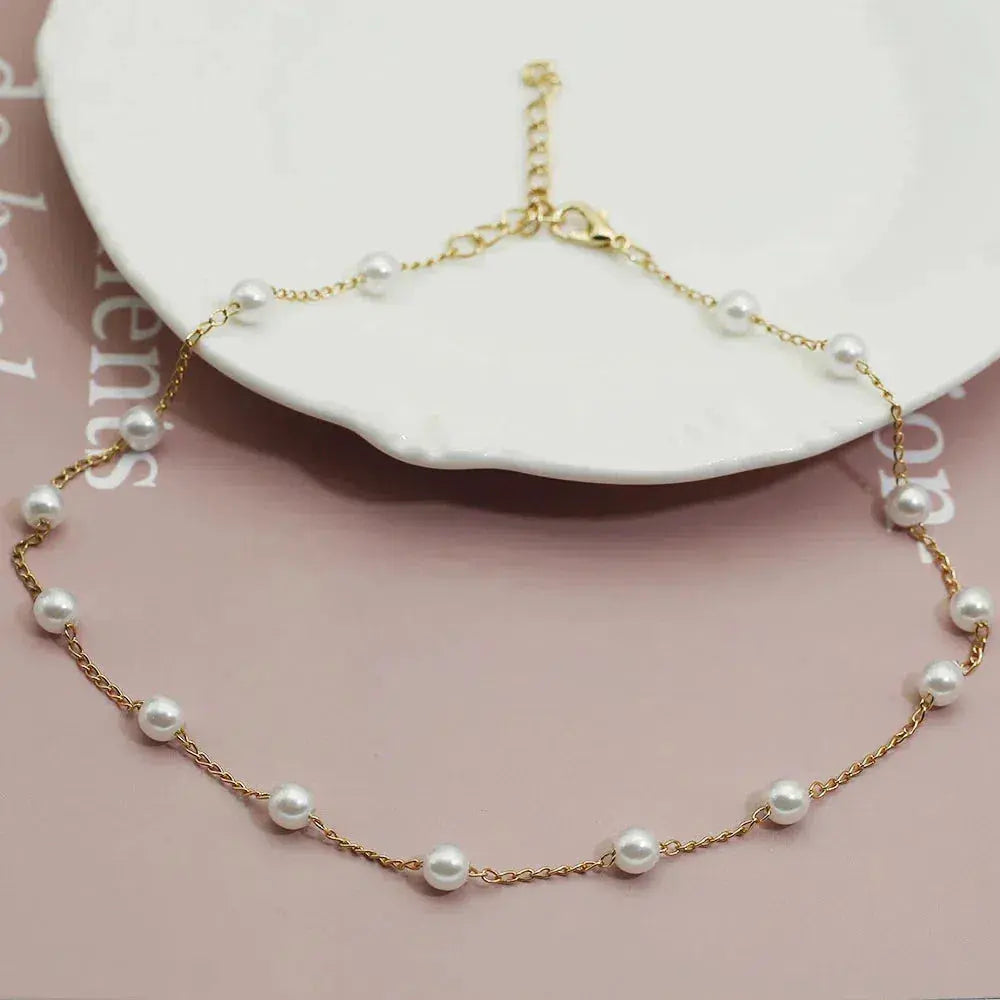 Vivienne – Collar dorado con perlas