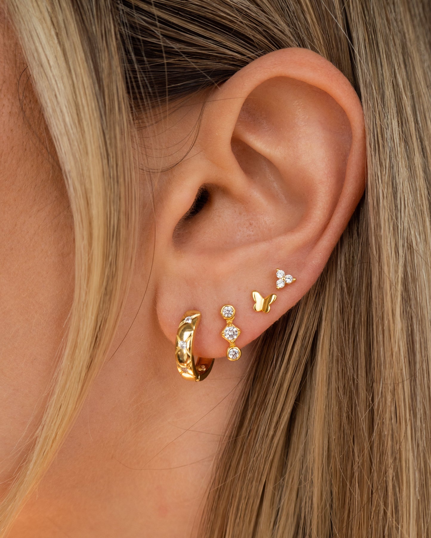 Aretes de Flor de Tres Cristales Dorados
