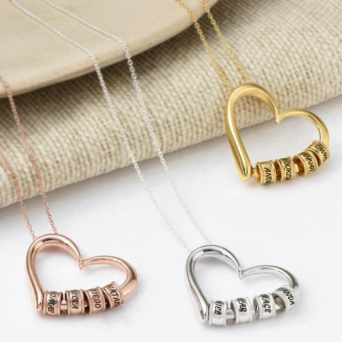 Maya – Collar Corazón con Anillos Grabados