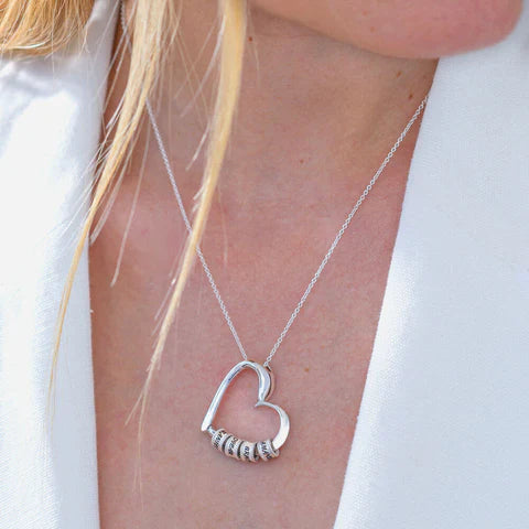 Maya – Collar Corazón con Anillos Grabados