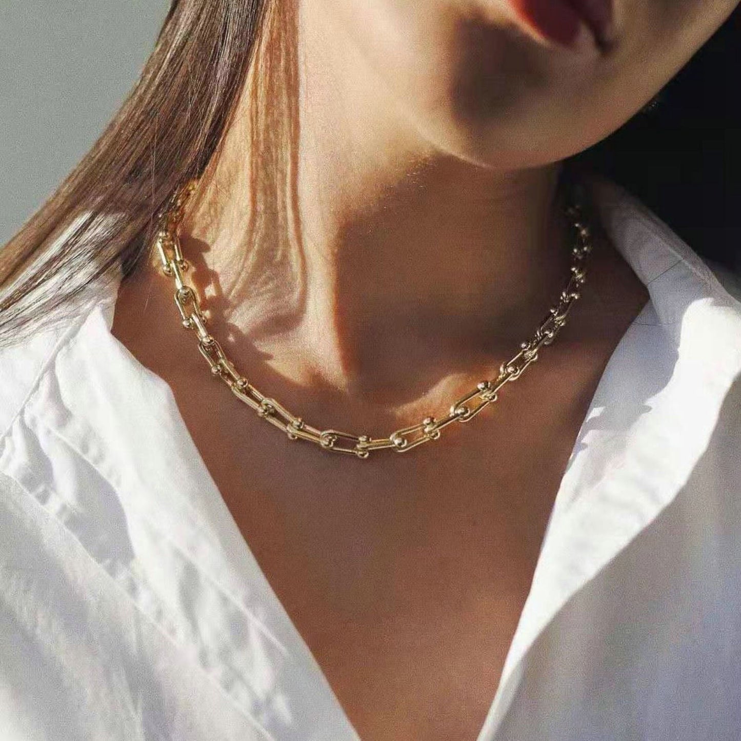 Collar de cadena gruesa de oro en cascada