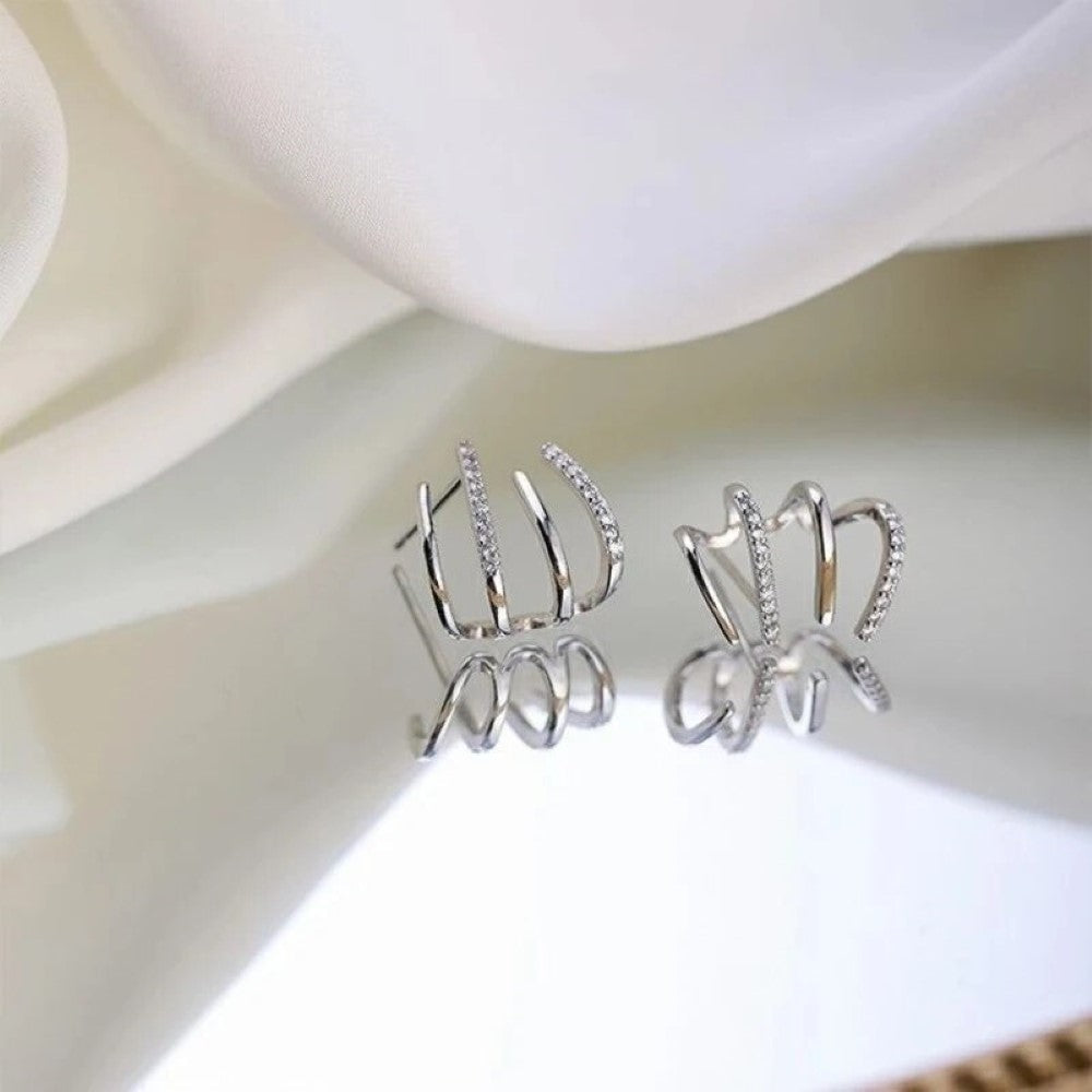 Aros Huggie con Zircónia en Incrustaciones de Cuatro Lados