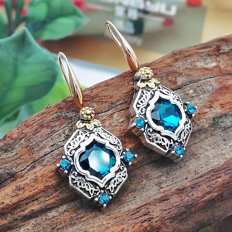 Élianne – Gotas de Azur en Oro y Plata