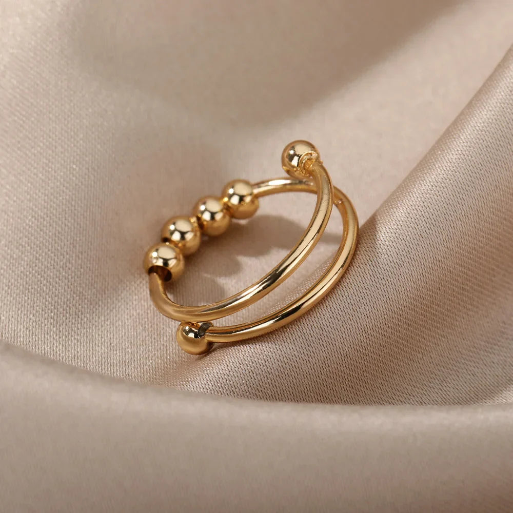 Maelis – Anillo Anti-Estrés con Perlas Giratorias