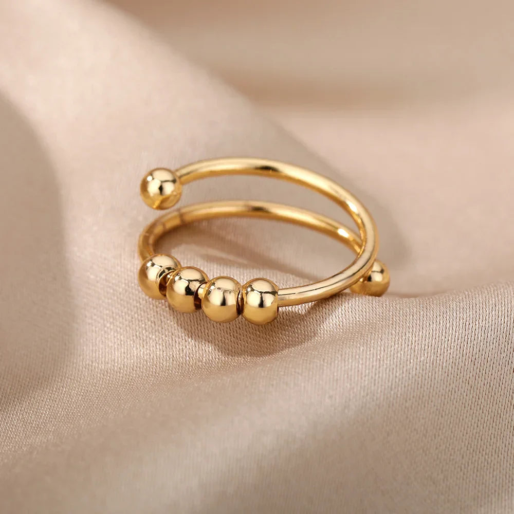 Maelis – Anillo Anti-Estrés con Perlas Giratorias