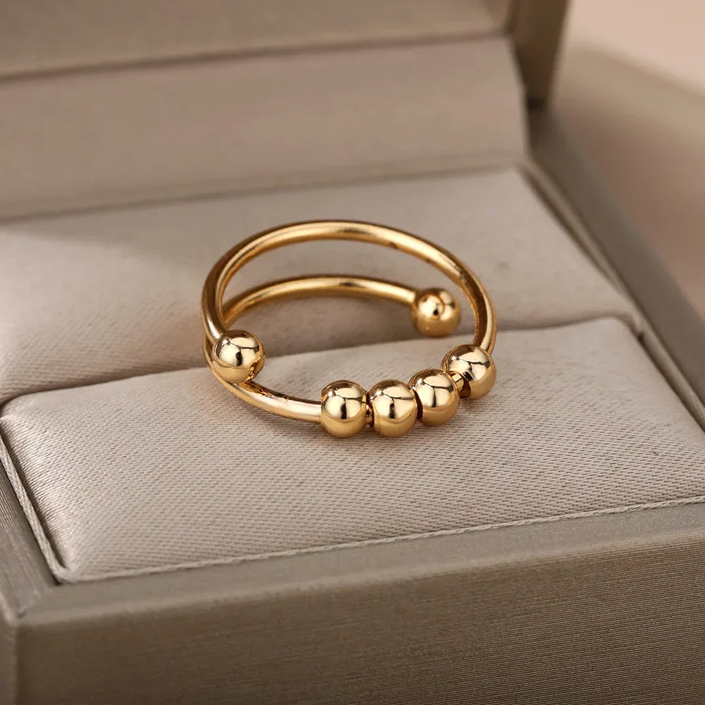 Maelis – Anillo Anti-Estrés con Perlas Giratorias