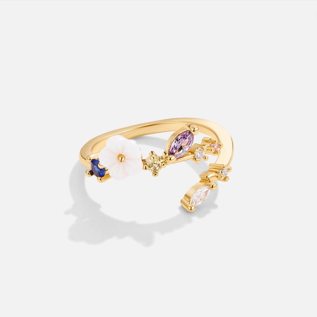Leah - Anillo dorado con flor de cristal blanco