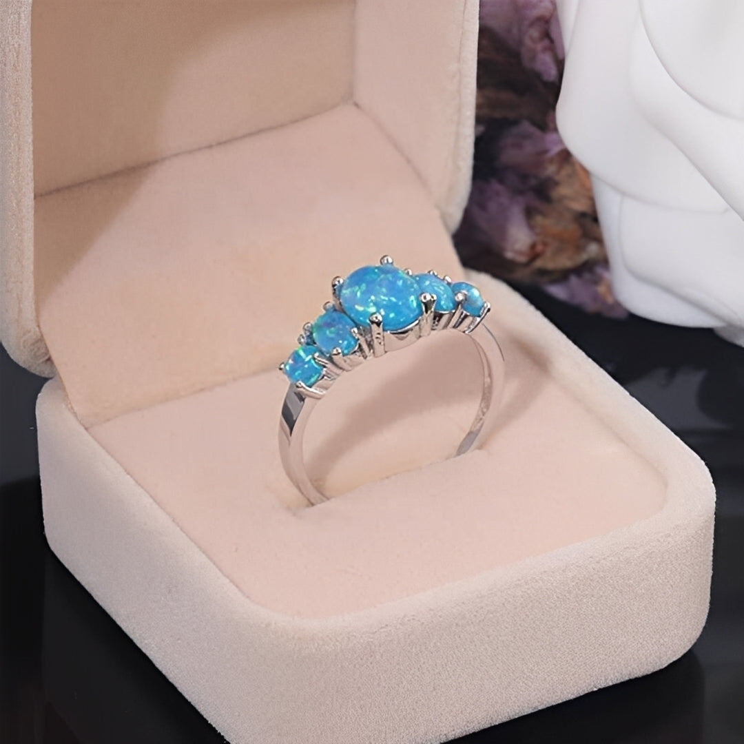 Merly – Anillo Ópalo de Fuego Azul en Plata
