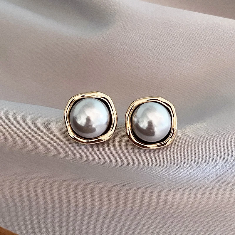 Zina – Criollas en Perlas Negras Elegantes