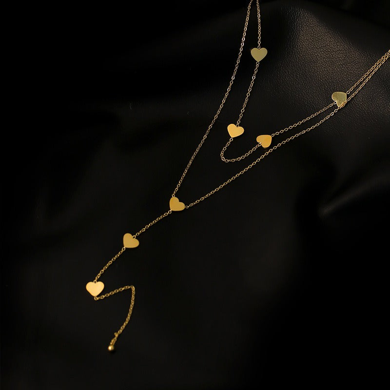 Christy – Collar Multi-Filas Corazones Dorados