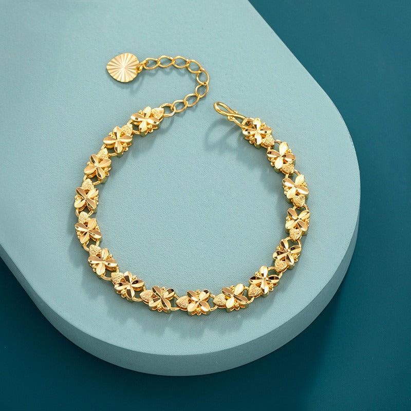 Edith – Pulsera Dorada con Motivo de Margarita