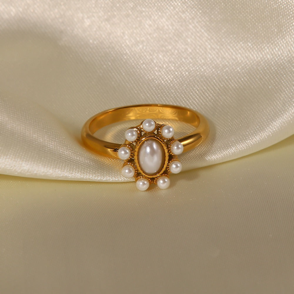 Cynthia – Anillo Dorado con Perla
