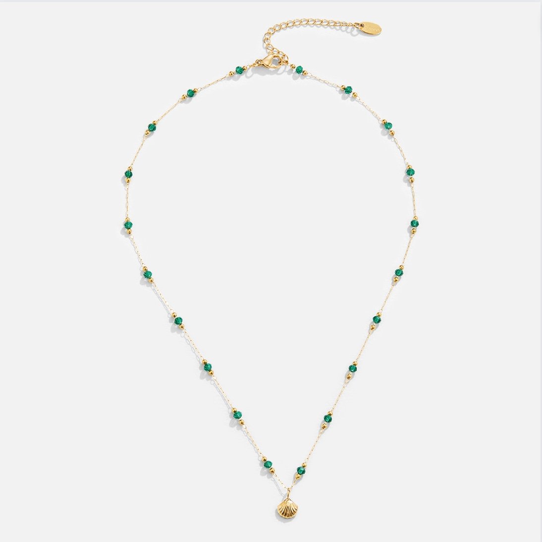 Nerissa – Collar Dorado Concha y Perlas Verdes