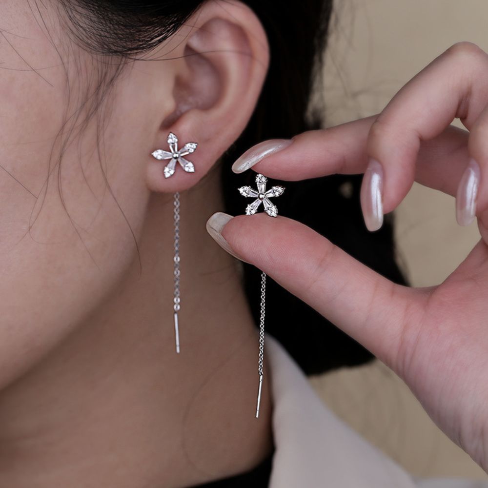 Pendientes de hilo para damas con motivo de flor