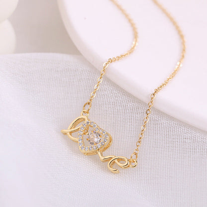 Love Spelled - Collar con colgante de amor