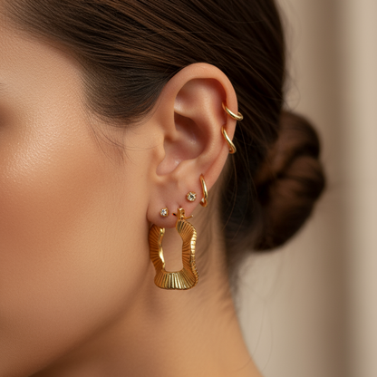 Alba – Pendientes Ondulados en Acero Titanio