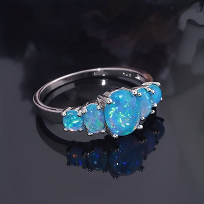 Merly – Anillo Ópalo de Fuego Azul en Plata