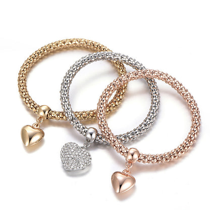 Aria – Pulsera de Metal con Corazones Sólidos
