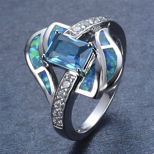 Coralie – Anillo Precioso Zafiro Azul & Ópalo