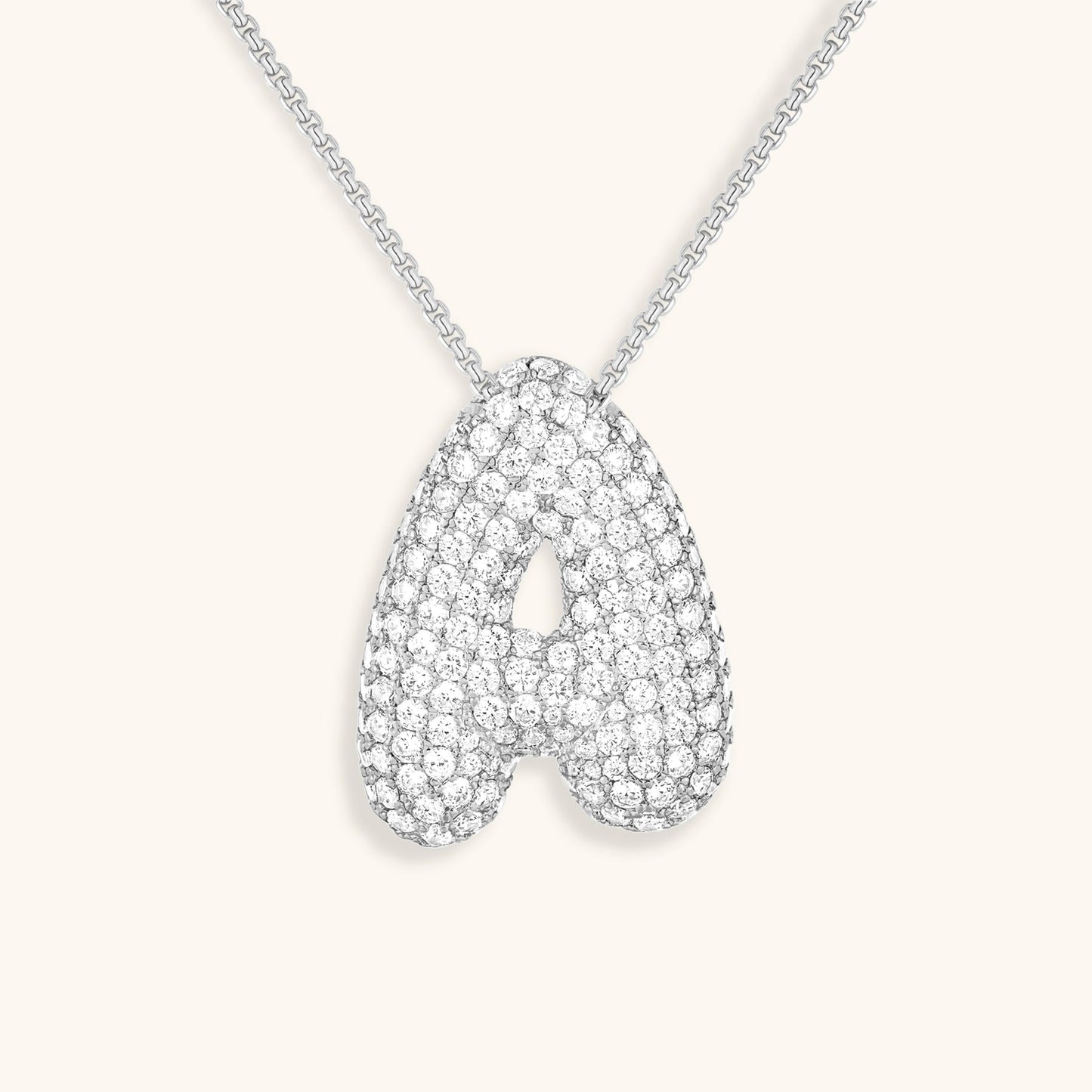 Collar de diamantes con inicial en burbuja
