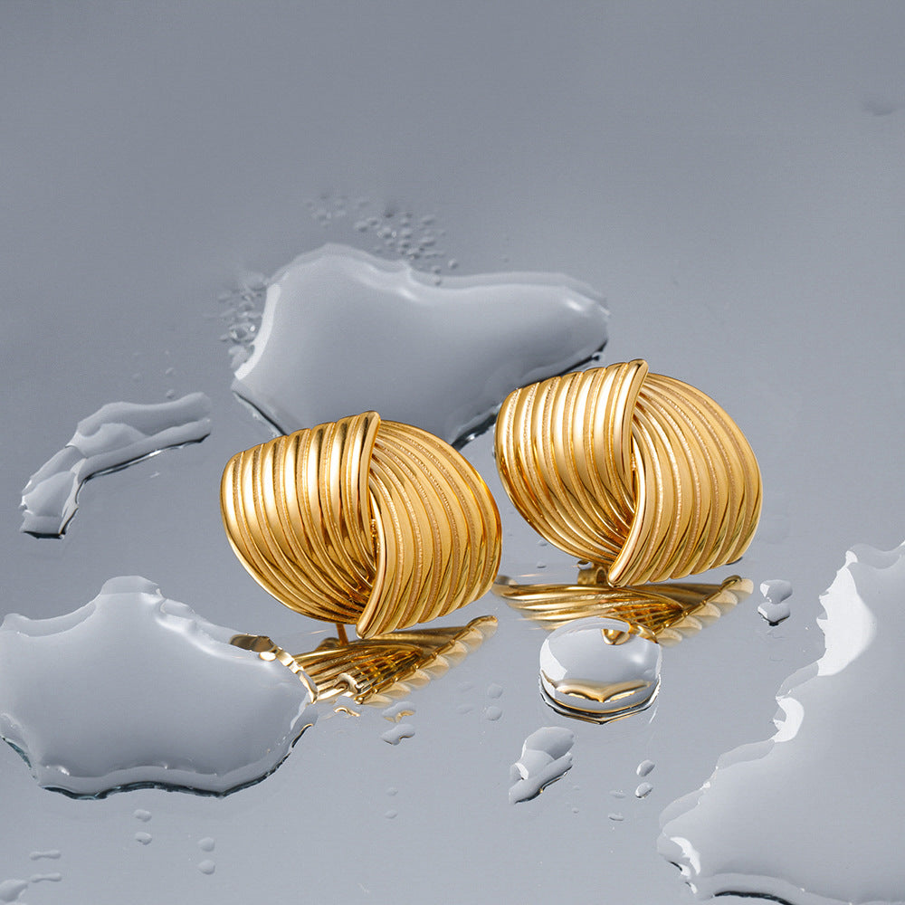 Ariane – Pendientes Trenzados en Plata