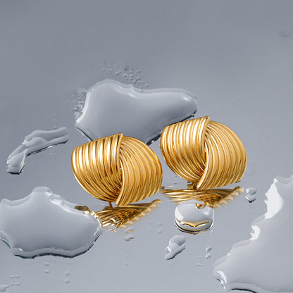 Ariane – Pendientes Trenzados en Plata