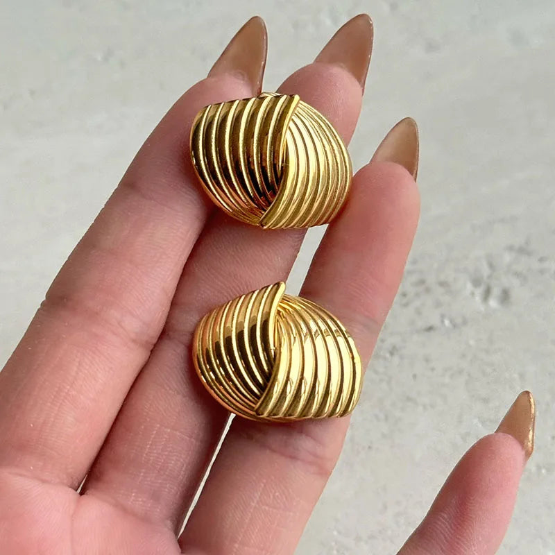 Ariane – Pendientes Trenzados en Plata