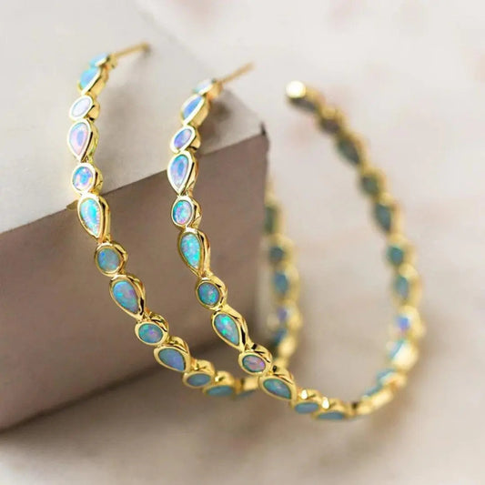 Elisha – Pendientes Vintage Dorados con Ópalo Azul