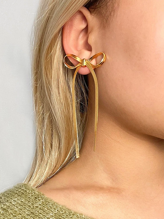 Cate – Pendientes Largos Nudo Cadena Serpiente Dorados