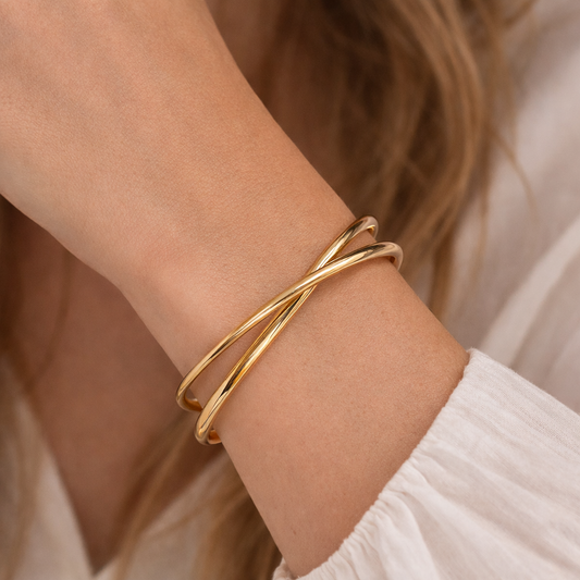 Nellie – Brazalete Dorado Diseño Entrelazado Elegante