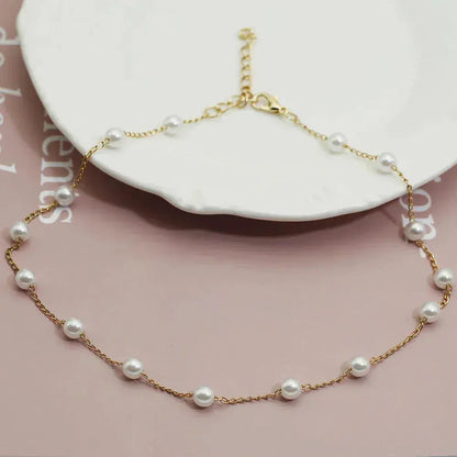 Vivienne – Collar dorado con perlas