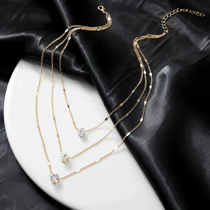Sally – Collier Dorado Tres Pendientes Zirconia