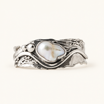 Anillo de Mujer con Diseño en Ola y Piedra Decorativa