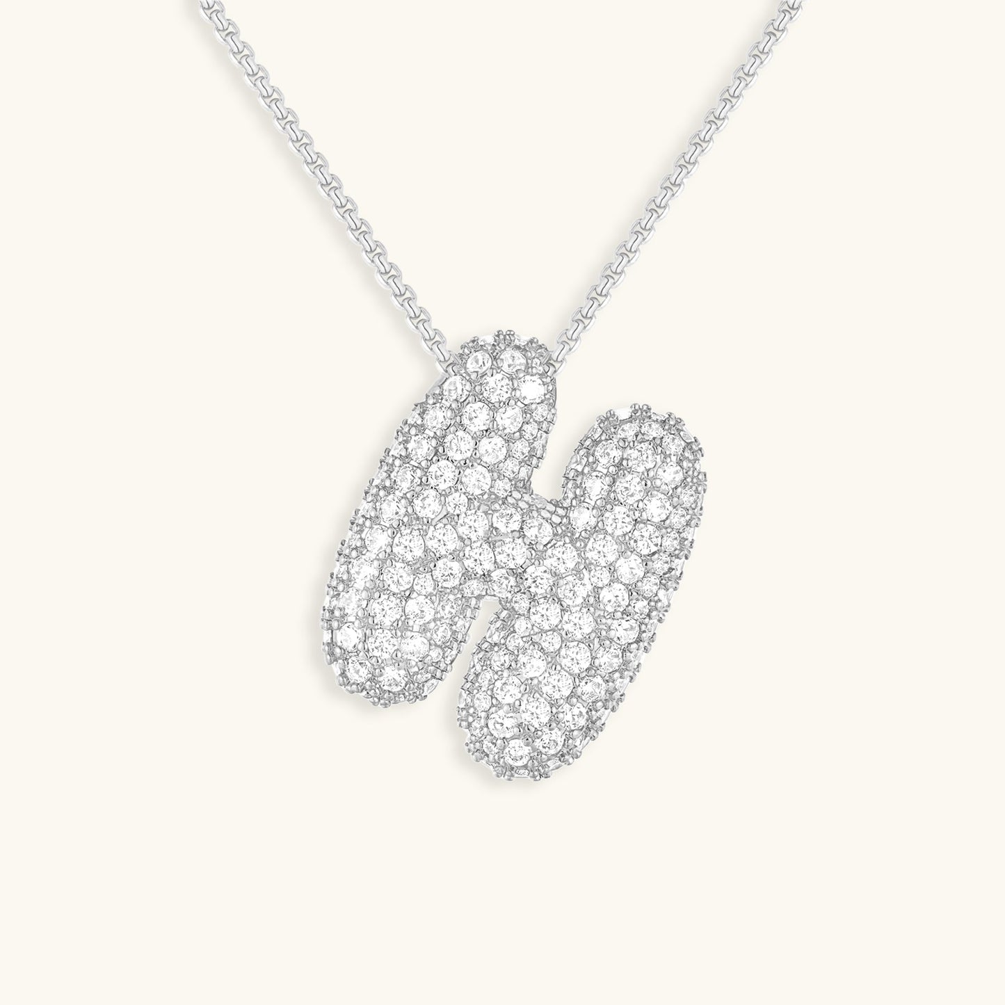 Collar de diamantes con inicial en burbuja