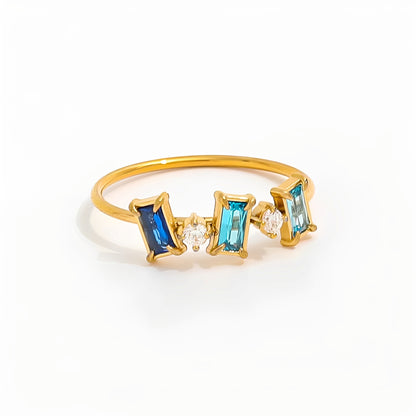 Sharlene – Anillo Skyline con Brillo Azul y Estilo Elegante