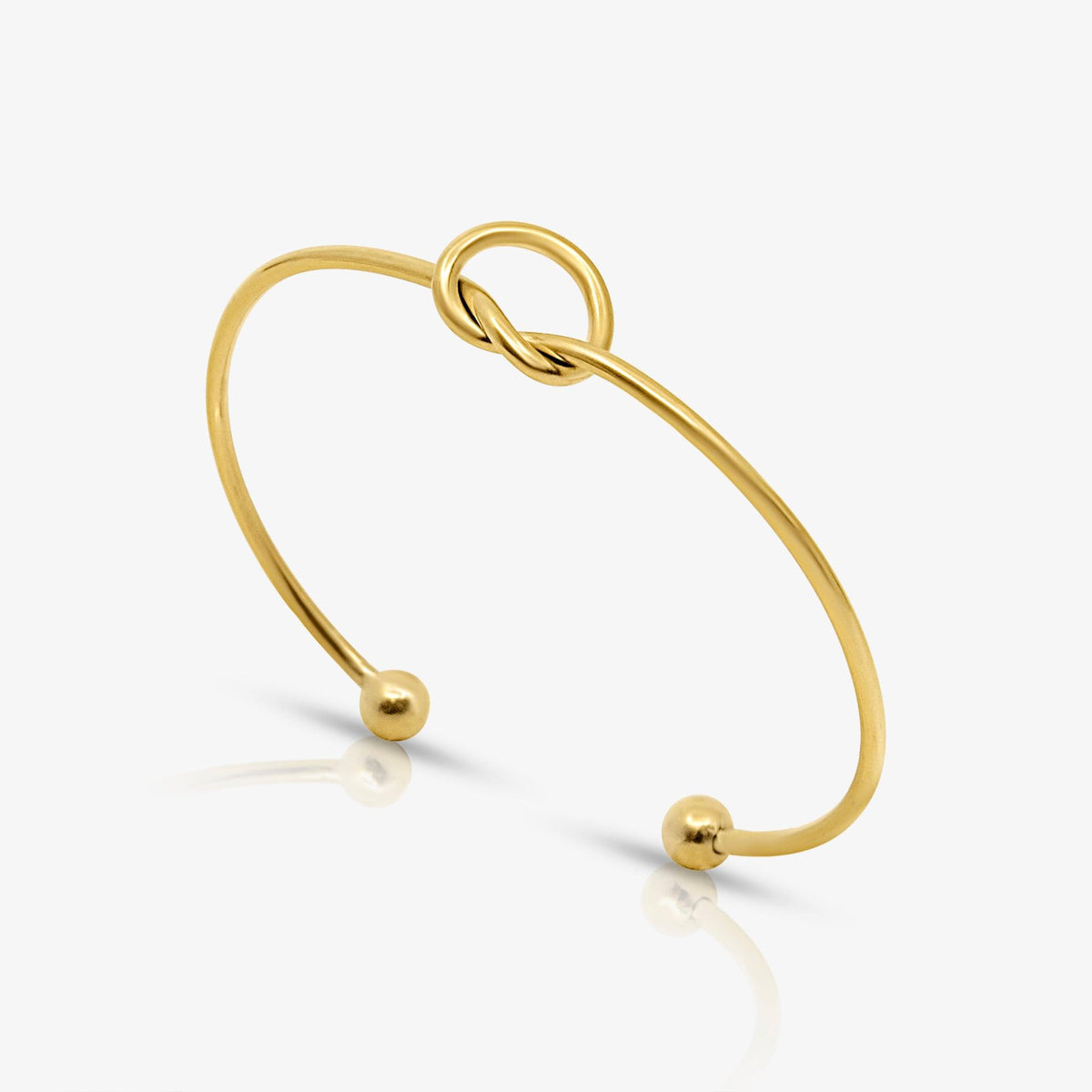 Brazalete Abierto para Damas con Motivo de Nudo y Extremos Esféricos