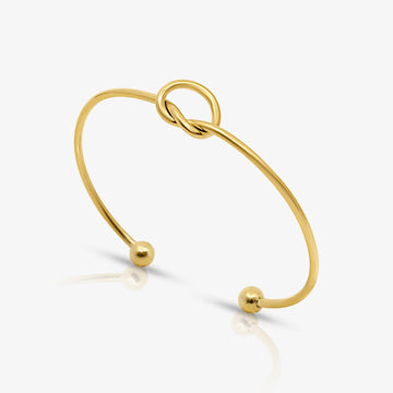 Brazalete Abierto para Damas con Motivo de Nudo y Extremos Esféricos