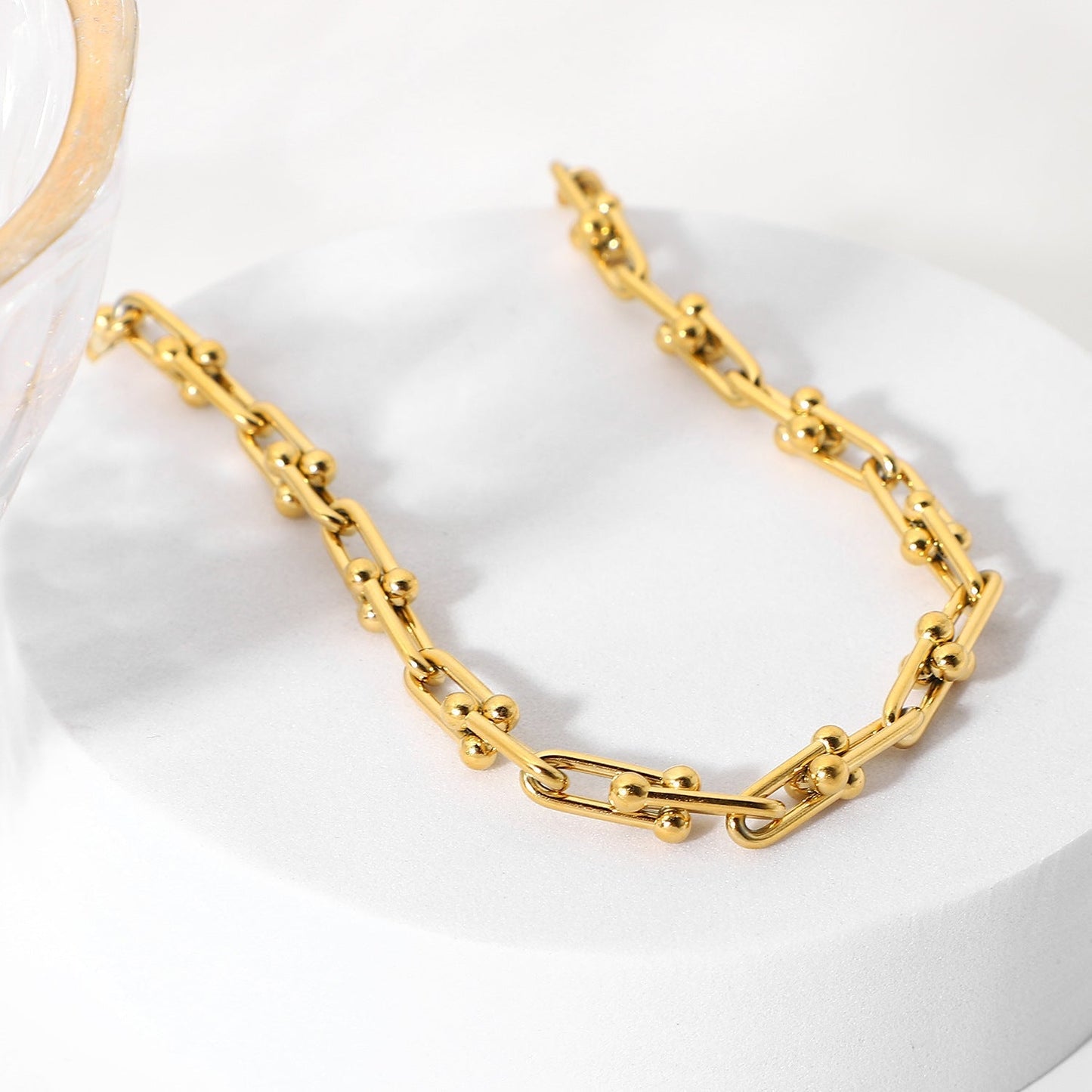 Collar de cadena gruesa de oro en cascada