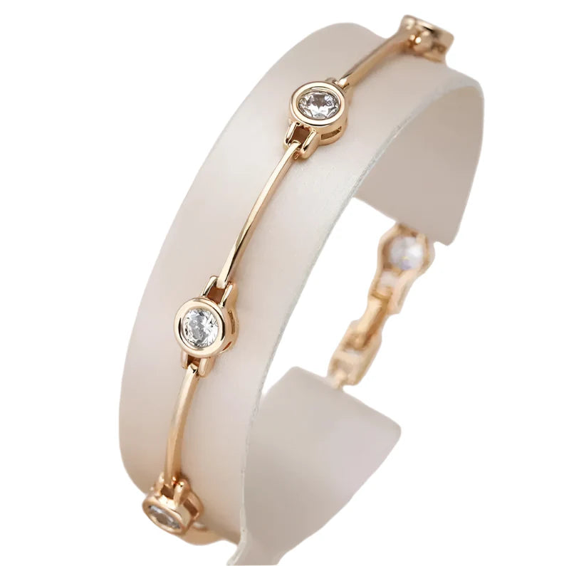 Aveline – Pulsera Delicada de Oro con Dijes de Circonia