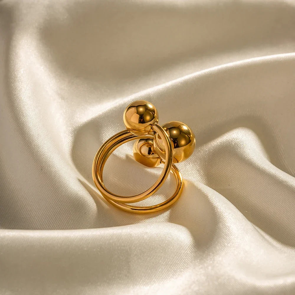 Anillo abierto ajustable para mujeres con diseño de tres esferas y estructura multibanda