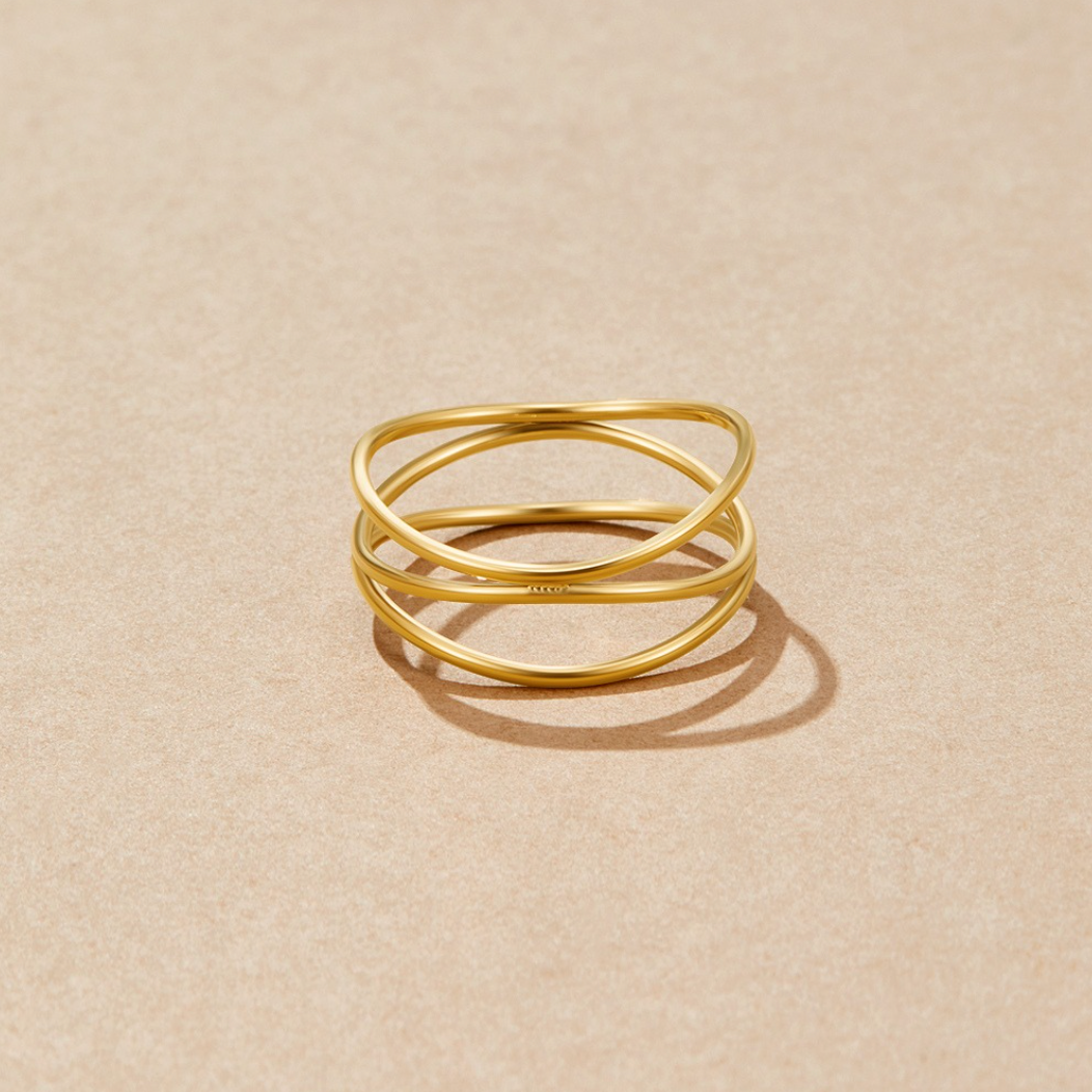 Amara – Anillo Bucle Infinito Dorado