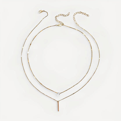Virelle – Collar Superpuesto Dorado de Doble Fila con Colgante