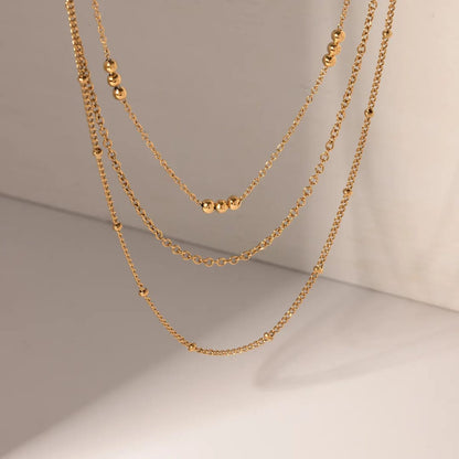 Alina – Collar Dorado de Tres Capas