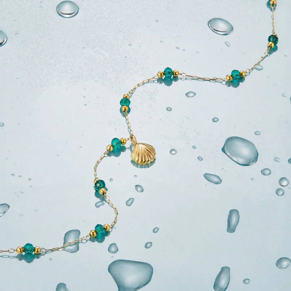 Nea – Collar Concha Dorado
