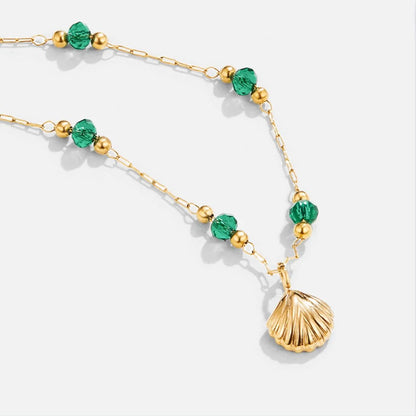 Nea – Collar Concha Dorado
