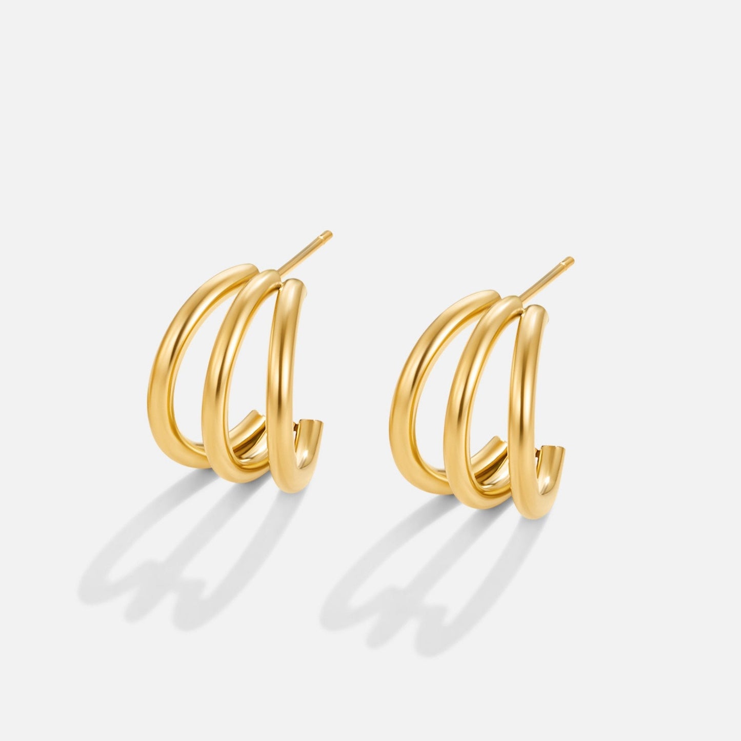 Anaya – Aretes Creolas Triples Doradas