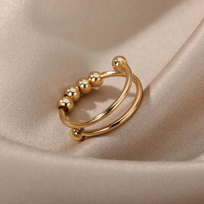 Maelis – Anillo Anti-Estrés con Perlas Giratorias